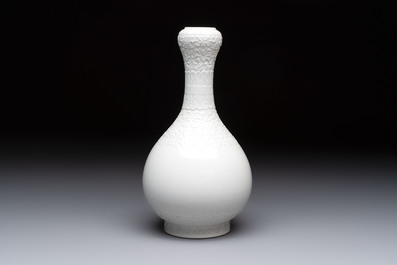 A Chinese white-glazed garlic-head vase and a robin&rsquo;s egg-glazed vase, Qianlong mark, 20th C.