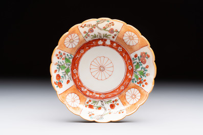 A Chinese famille verte bowl and saucer with floral design, Kangxi