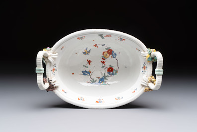 A Meissen kakiemon-style basket with figural head handles, Germany, 18th C.