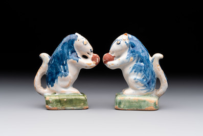 A pair of polychrome Dutch Delft miniature models of squirrels, a duck and a swan, 18th C.