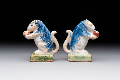A pair of polychrome Dutch Delft miniature models of squirrels, a duck and a swan, 18th C.