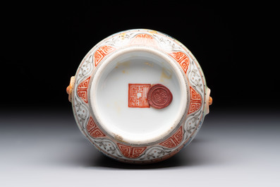 A Chinese famille rose vase with ladies in a garden, Qianlong mark, 19/20th C.