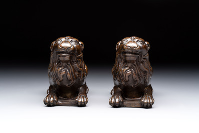 A pair of reclining bronze lions, probably Dinant, 16th C.