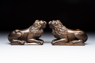 A pair of reclining bronze lions, probably Dinant, 16th C.