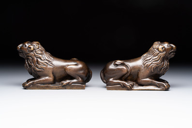 A pair of reclining bronze lions, probably Dinant, 16th C.
