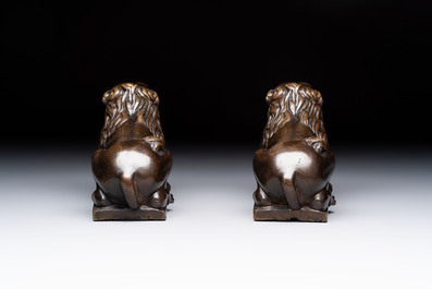A pair of reclining bronze lions, probably Dinant, 16th C.