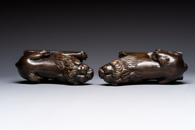 A pair of reclining bronze lions, probably Dinant, 16th C.