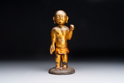 A rare and large Chinese gilt-lacquered bronze Buddha, Ming