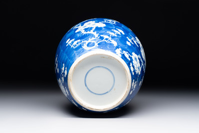 A Chinese blue and white 'prunus on cracked ice' jar, a tea caddy, a covered teapot, and four famille rose cups, 19th C.