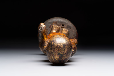 A rare and large Chinese gilt-lacquered bronze Buddha, Ming
