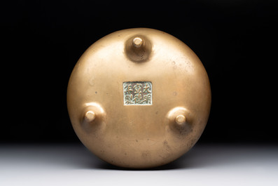 A Chinese bronze tripod censer, Xuande mark, 18th C.