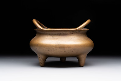 A Chinese bronze tripod censer, Xuande mark, 18th C.