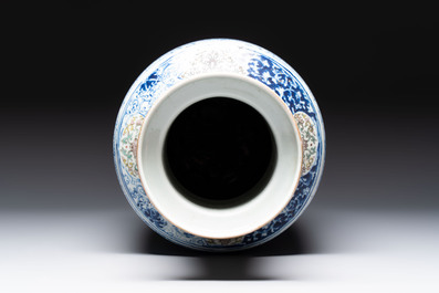 A Chinese blue, white and famille verte rouleau vase with figural and peacock design, Qianlong mark, 19th C.