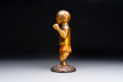 A rare and large Chinese gilt-lacquered bronze Buddha, Ming