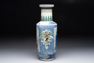 A Chinese blue, white and famille verte rouleau vase with figural and peacock design, Qianlong mark, 19th C.