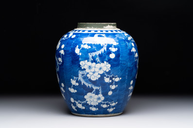 A Chinese blue and white 'prunus on cracked ice' jar, a tea caddy, a covered teapot, and four famille rose cups, 19th C.