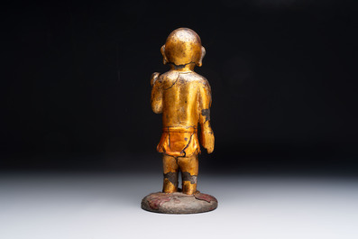 A rare and large Chinese gilt-lacquered bronze Buddha, Ming