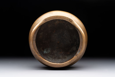 A Chinese bronze tripod censer, Xuande mark, 18th C.