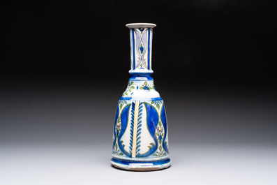 A polychrome pottery hookah base and a Persian turquoise-glazed pottery jar, late Qajar period, Iran, 19/20th C.