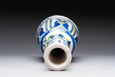 A polychrome pottery hookah base and a Persian turquoise-glazed pottery jar, late Qajar period, Iran, 19/20th C.