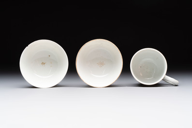 A varied collection of three Chinese famille rose 'mythological subject' cups and two saucers, Qianlong
