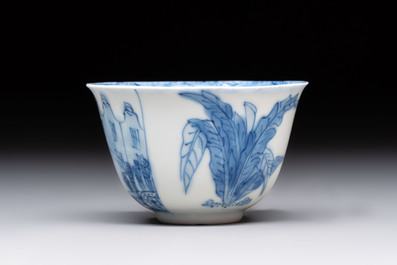 A Chinese blue and white 'Rotterdam Riot' cup and saucer, jade mark, Kangxi