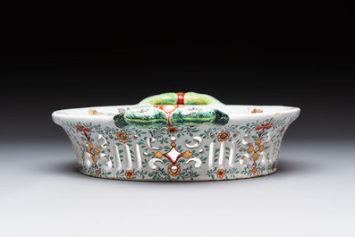 A polychrome Dutch Delft petit feu reticulated basket after a Chinese famille rose example, 18th C.