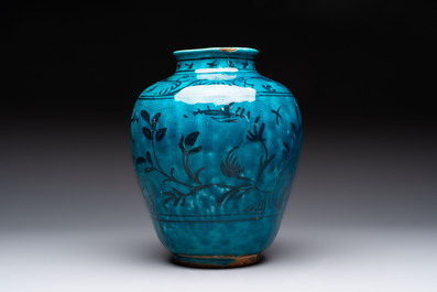 A polychrome pottery hookah base and a Persian turquoise-glazed pottery jar, late Qajar period, Iran, 19/20th C.