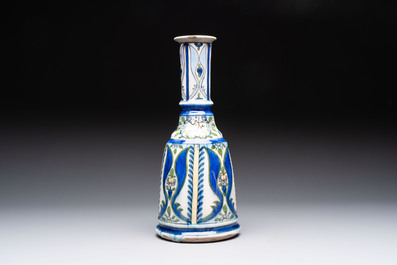A polychrome pottery hookah base and a Persian turquoise-glazed pottery jar, late Qajar period, Iran, 19/20th C.