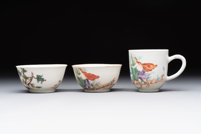 A varied collection of three Chinese famille rose 'mythological subject' cups and two saucers, Qianlong