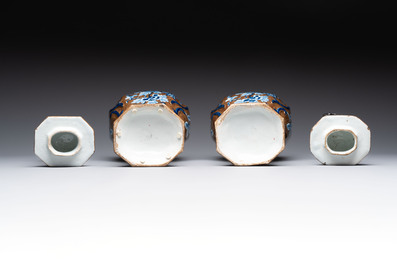 A rare pair of blue and white Dutch Delft brown-ground vases and covers, 18th C.