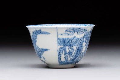 A Chinese blue and white 'Rotterdam Riot' cup and saucer, jade mark, Kangxi