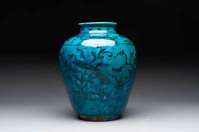 A polychrome pottery hookah base and a Persian turquoise-glazed pottery jar, late Qajar period, Iran, 19/20th C.