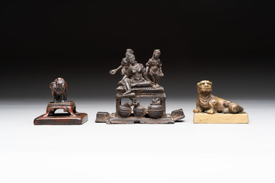 Five Chinese bronze seals and an Indonesian bronze figure group, 18/19th C.