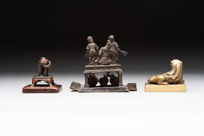 Five Chinese bronze seals and an Indonesian bronze figure group, 18/19th C.