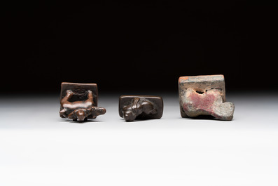 Five Chinese bronze seals and an Indonesian bronze figure group, 18/19th C.
