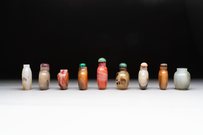 A collection of nine Chinese agate snuff bottles, 20th C.