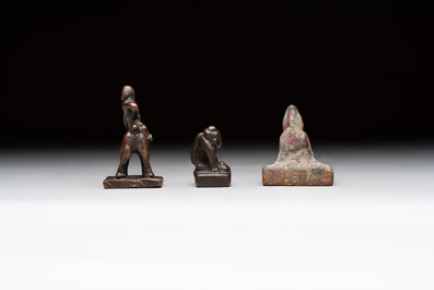 Five Chinese bronze seals and an Indonesian bronze figure group, 18/19th C.
