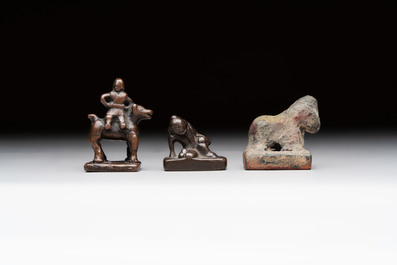 Five Chinese bronze seals and an Indonesian bronze figure group, 18/19th C.