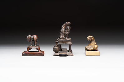Five Chinese bronze seals and an Indonesian bronze figure group, 18/19th C.