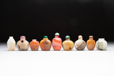 A collection of nine Chinese agate snuff bottles, 20th C.