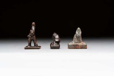 Five Chinese bronze seals and an Indonesian bronze figure group, 18/19th C.