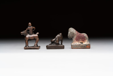 Five Chinese bronze seals and an Indonesian bronze figure group, 18/19th C.