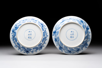 A pair of Chinese blue and white 'dragon' plates, Kangxi mark and of the period
