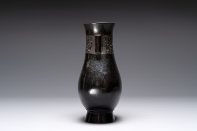A fine Chinese archaistic bronze 'Touhu' vase with Taotie design, 17/18th C.