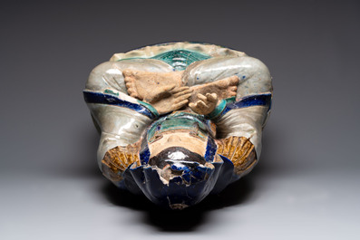 A large Chinese polychrome-glazed Shiwan stoneware figure of Guanyin, 19th C.