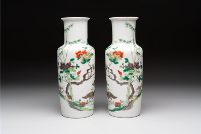 A pair of Chinese famille verte 'quails in blossoming landscape' rouleau vases, 19th C.