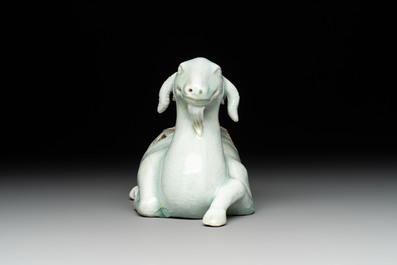 A pair of Chinese polychrome lions, a celadon-glazed goat, a yellow-glazed bowl and a sancai-glazed conical bowl, Chenghua mark, 19/20th C.