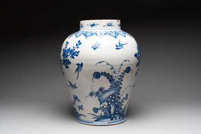 A large blue and white Dutch Delft Kangxi-style chinoiserie 'pheasant among peonies' vase, early 18th C.