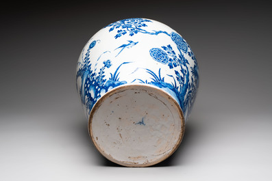 A large blue and white Dutch Delft Kangxi-style chinoiserie 'pheasant among peonies' vase, early 18th C.